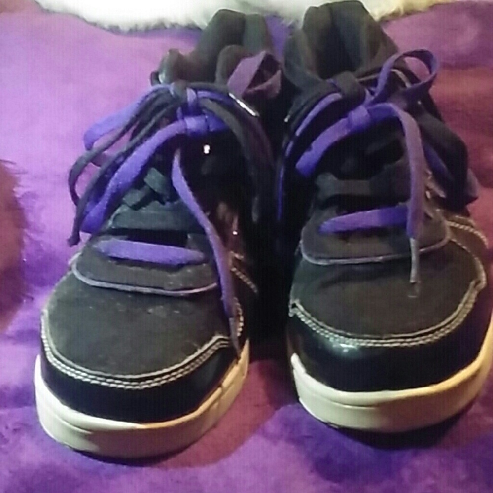 A pair of baby phat shoes